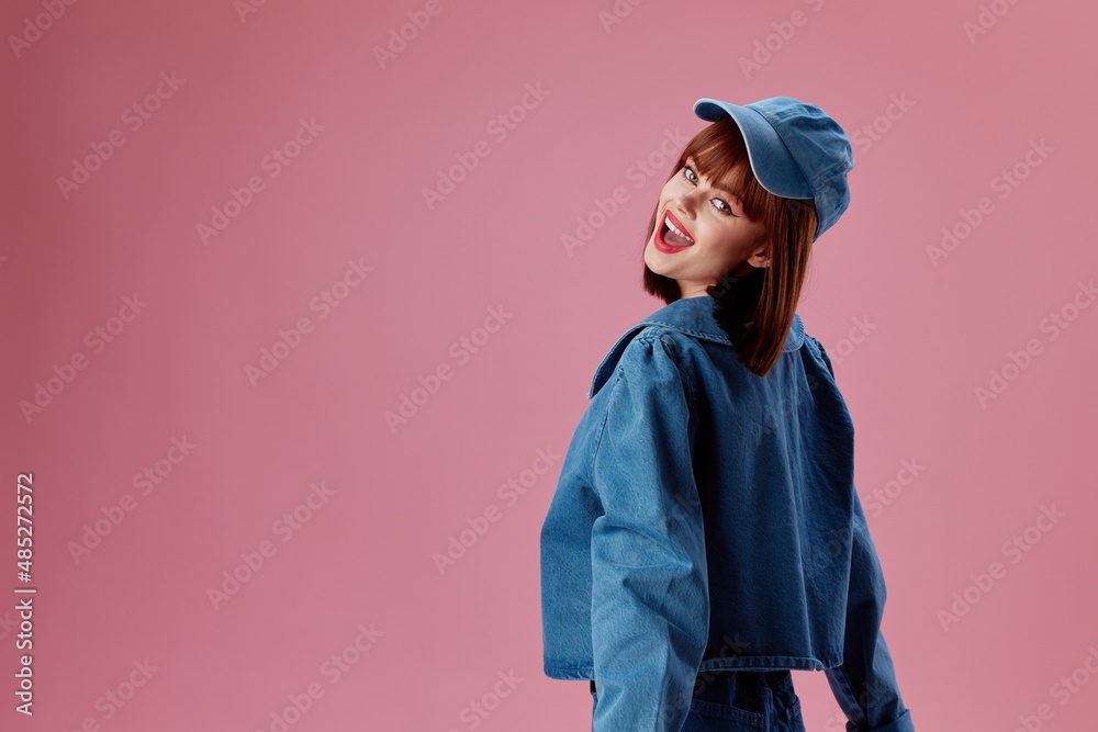 Portrait of a charming lady stylish denim clothing posing color background unaltered Portrait of a charming lady stylish denim clothing posing color background unaltered
