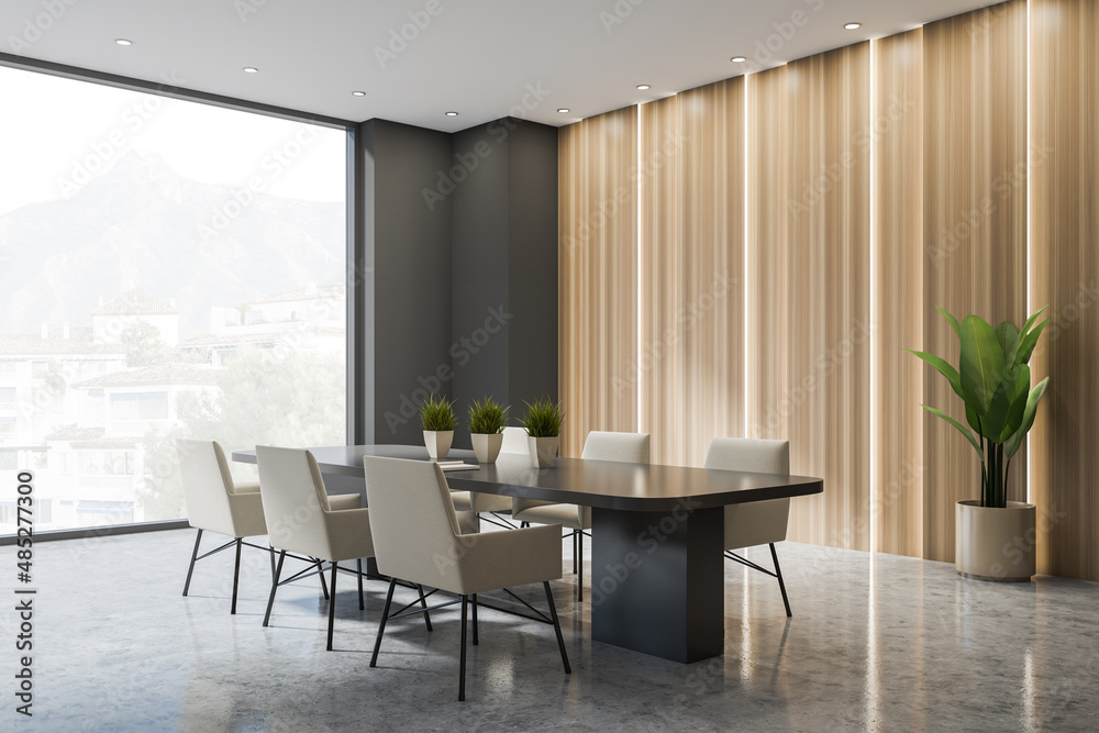 Corner view on dark office room interior with panoramic window Corner view on dark office room interior with panoramic window