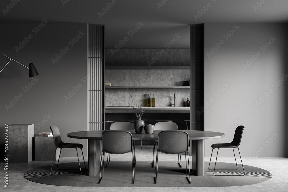 Dark kitchen interior with chairs and table, dining room and appliances Dark kitchen interior with chairs and table, dining room and appliances