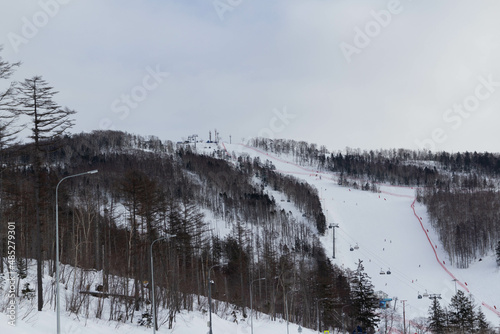 Ski campsite in winter, with a cable car.