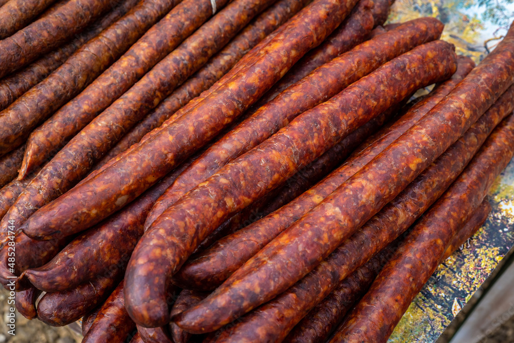 Fototapeta premium Very tasty homemade sausages, baked and fresh