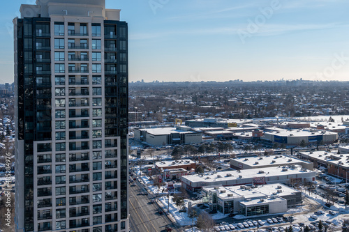 Toronto skyline blue skies condos and houses by finch ave east and don mills 