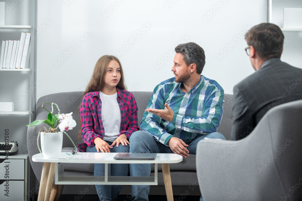 Social worker psychologist talking to father and daughter teenage. Parenting conflicts, kids crisis. Social worker psychologist talking to father and daughter teenage. Parenting conflicts, kids crisis.