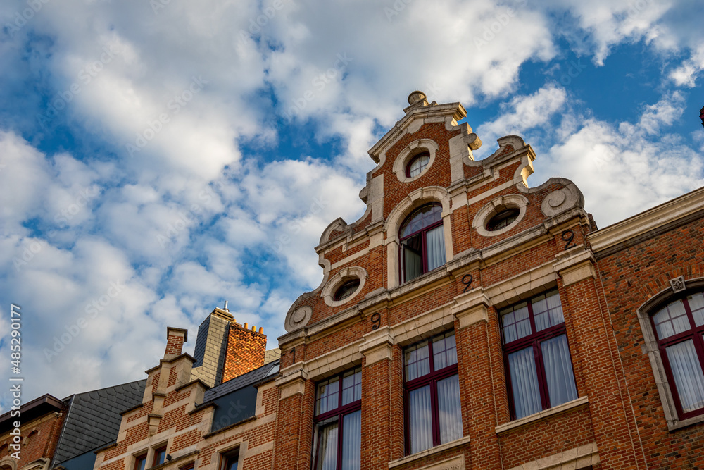Travel photograph, street view in a beautiful sunny September day with some clouds, Leuven, Belgium