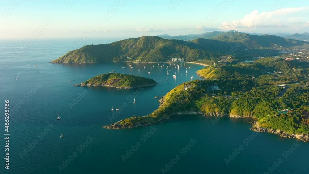 Amazing aerial view of Promthep Cape in Phuket Thailand at sunset, beautiful landmark, viewpoint, popular tourist destination Amazing aerial view of Promthep Cape in Phuket Thailand at sunset, beautiful landmark, viewpoint, popular tourist destination