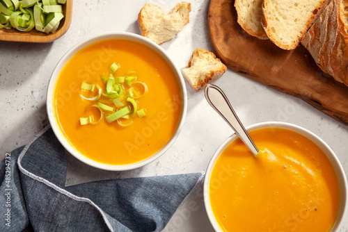 Bowl of homemade carrot and pumpkin soup
