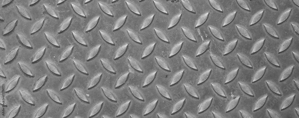 Metal Floor Texture, dark list with rhombus shapes of Black steel texture background Metal Floor Texture, dark list with rhombus shapes of Black steel texture background