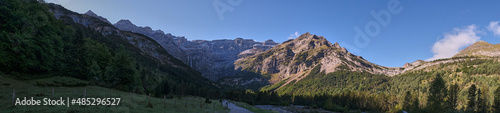 Panoramic view of the Cirque de Gavarnie with the first rays of the sun, Monte Perdido massif. France, Occitanie, Hautes Pyrenees