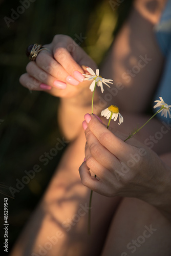 hand with flower