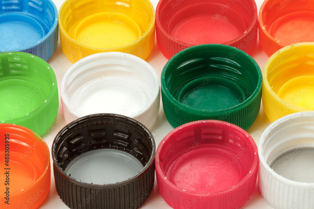 Closeup of colorful plastic bottle caps Closeup of colorful plastic bottle caps