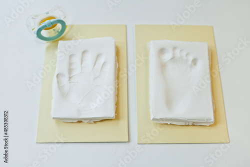 Baby footprint and handprint clay mold To remember in the future how small the baby was in childhood