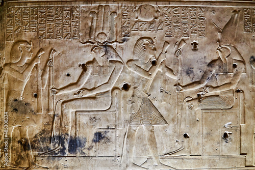A Wall Relief from the temple at Abydos, depicting the king presenting offerings to the gods photo