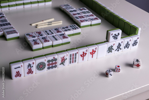 Fototapeta Naklejka Na Ścianę i Meble -  Mahjong. Riichi Mahjong set for playing. Space for text.