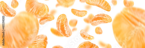 Falling tangerine, flying tangerine slices of different sizes, isolated on white background, selective focus