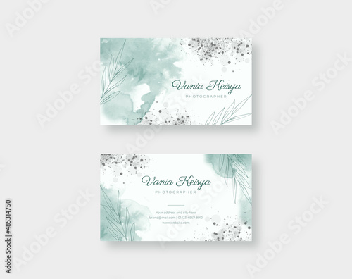 Beautiful business card template with green watercolor texture