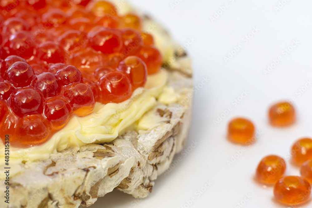Crispy wheat crackers with red caviar, spread and lemon. Natural Diet Bread Crispy wheat crackers with red caviar, spread and lemon. Natural Diet Bread