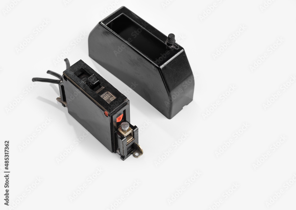Old retro bakelite electric breaker on a white background Old retro bakelite electric breaker on a white background