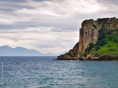 Wallpaper Mural Castle stone wall above sea. Cloudy weather. Torontodigital.ca