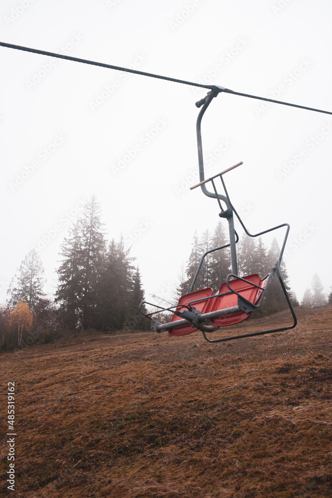 A ski lift is a mechanism for transporting skiers up a hill. Ski lifts are typically a paid service at ski resorts. A ski lift is a mechanism for transporting skiers up a hill. Ski lifts are typically a paid service at ski resorts.