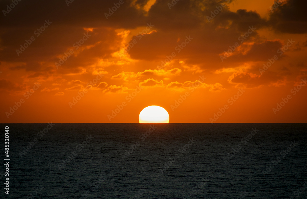 Sun appears above the horizon in the morning