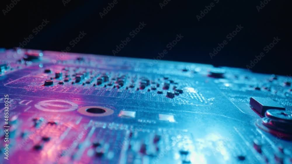 Motion over microchip of modern pc motherboard in studio