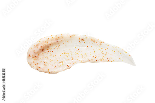 Drop shaped organic homemade body scrub smear with brown grains cosmetic product isolated on white background upper close view