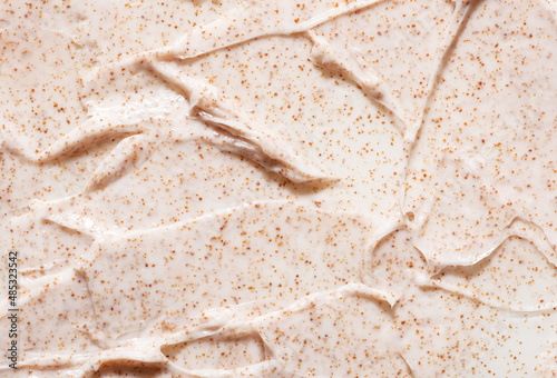 Obraz na plátně Irregular pattern of creamy organic scrub with brown grains professional skincar