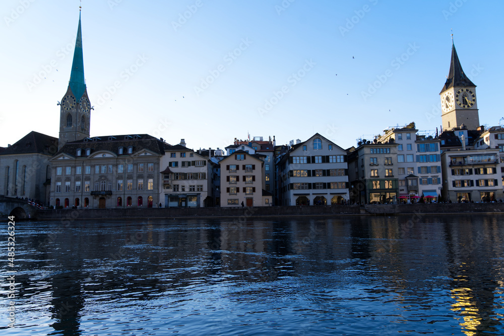 Church tower of medieval protestant churches Women's minster and St. Peter at the old town of Zürich on a sunny winter day. Photo taken February 5th, 2022, Zurich, Switzerland.