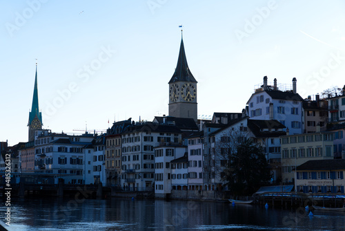 Church tower of medieval protestant churches Women's minster and St. Peter at the old town of Zürich on a sunny winter day. Photo taken February 5th, 2022, Zurich, Switzerland.