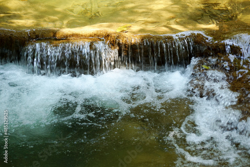 Water flows down the different levels in the Mae Khamin creek. Kanchanaburi Province, Thailand