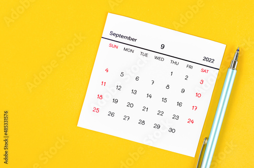 September 2022 calendar on yellow background.