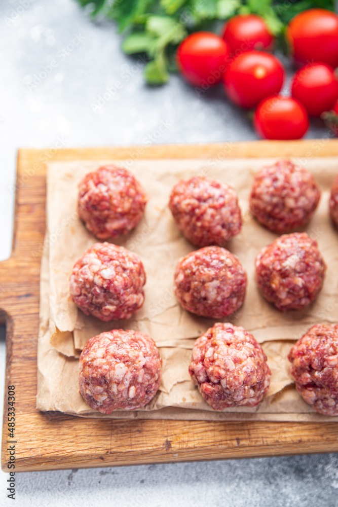 meatballs raw meat beef pork chicken fresh portion dietary healthy meal food diet still life snack on the table copy space food background rustic top view keto or paleo diet