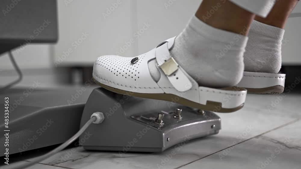 custom made wallpaper toronto digitalDoctor foot white shoes presses button control patient's chair dentistry, podology. Adjusts comfortable position examination, raises patient up. Automatic multifunctional chair modern clinic