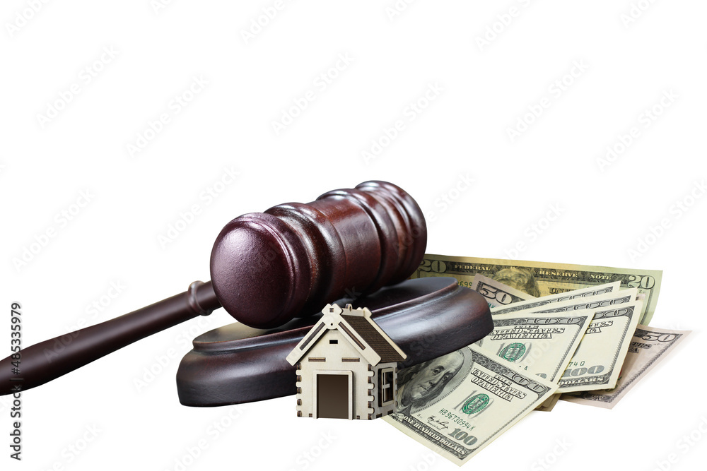 Abstract photo with wooden gavel, american dollars and abstract house isolated on white background as symbol of sale of mortgage or emergency housing at auction