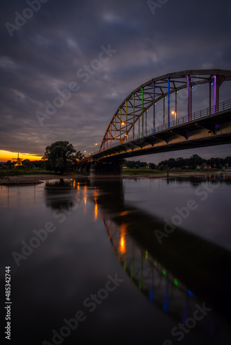 Bridge in Deventer lit with the colors for the LGBT community