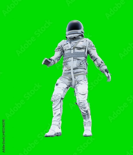 Astronaut isolated on green background. © Charlie