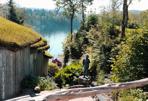 View of the monument to Edvard Grieg at the Trollhaugen Museum on the Fjord in the vicinity of Bergen on a clear sunny day, Norway. Travel landscape sights of Europe. photo