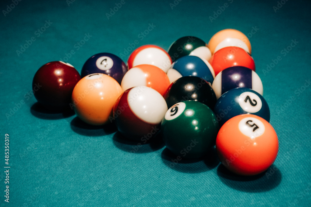 Pool game - balls in triangular shape on a table Pool game - balls in triangular shape on a table