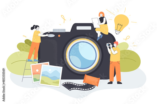 Huge camera and tiny people taking pictures. Photographer with camera, photos of landscapes flat vector illustration. Photography, occupation concept for banner, website design or landing web page