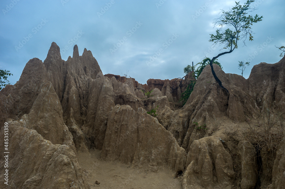 Ancient rock formations in peculiar shapes, in an area known for its excavated Paleolithic relics (Sao Din Na Noi) in Nan Province, Thailand