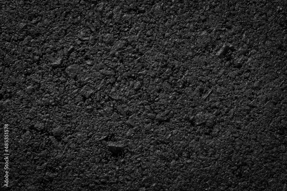 Fototapeta premium black asphalt texture. asphalt road. stone asphalt texture background black granite gravel
