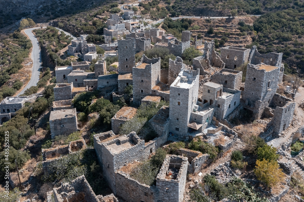 Clusters of abandoned houses, towers and chapels on the hills, Vatheia (or Vathia), Greece