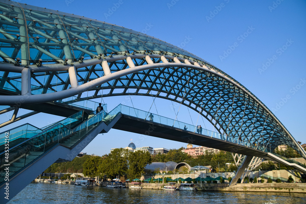 Naklejka premium The Tbilisi Peace Bridge at day with blue sky in Tiblisi, Georgia