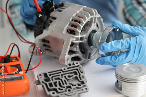 Фотография Replacement and testing of alternator and diagnostic equipment closeup