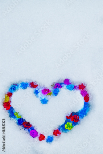 Heart made of crystalls on snow photo