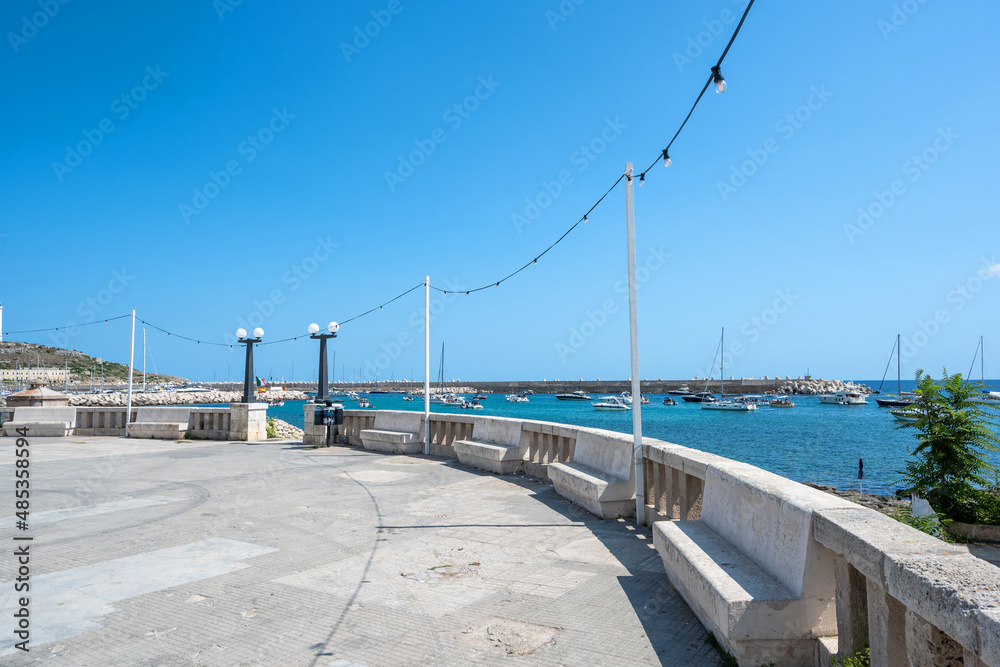 Santa Maria di Leuca, Santa Maria di Leuca, Puglia, Italy. August2021. View of the harbor from the promenade along the sea, beautiful summer day.