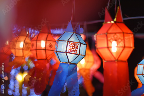 Yi Peng colorful paper lanterns decoration at night Loy Krathong Festival northern thailand. photo