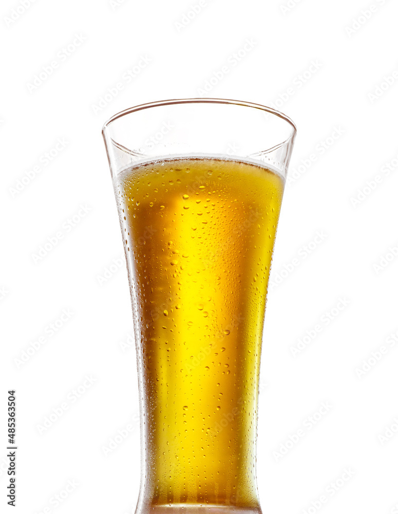 Glass of fresh cider or soft drink golden color, isolated on white background. Full glass of cold non-alcoholic beer without foam, close-up. Glass of fresh cider or soft drink golden color, isolated on white background. Full glass of cold non-alcoholic beer without foam, close-up.