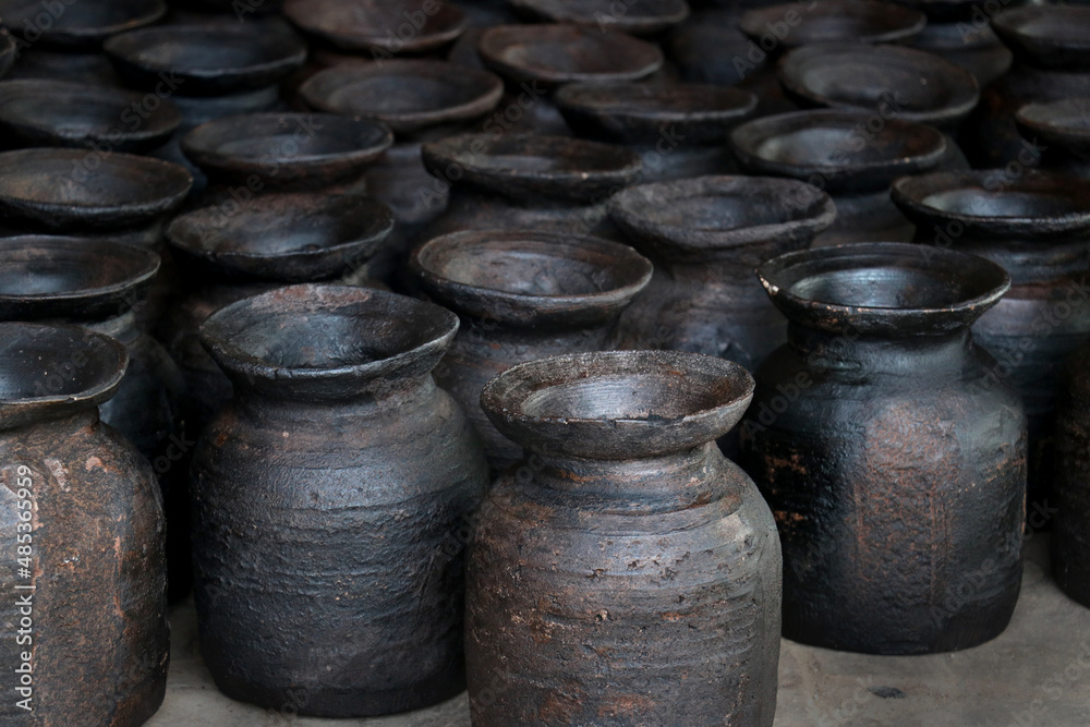 old wooden Clay pots.Black tradional clay vases old wooden Clay pots.Black tradional clay vases