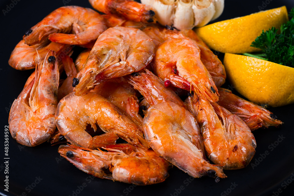Fried shrimp, on a black background, top view, no people, Fried shrimp, on a black background, top view, no people,